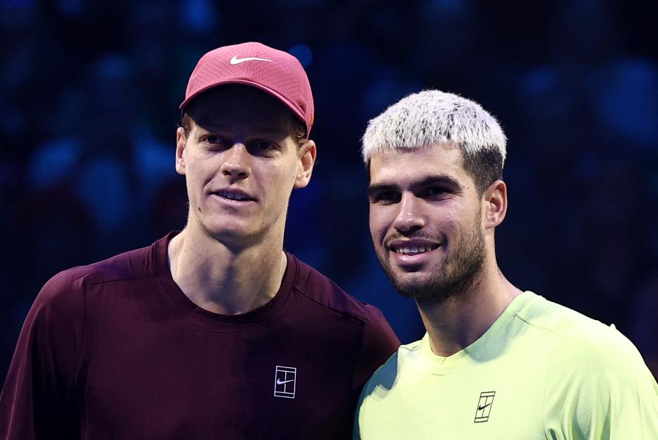 Italy's Jannik Sinner and Spain's Carlos Alcaraz pose for photos ahead of the final.