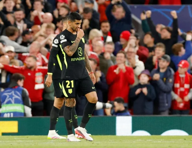 Liverpool, England, 9th September 2026. Cristian Romero of Atletico Madrid dejected following Liverpool?s second goal during the Liverpool vs Atletico Madrid UEFA Champions League match at Anfield, Liverpool. Picture credit should read: Cody Froggat