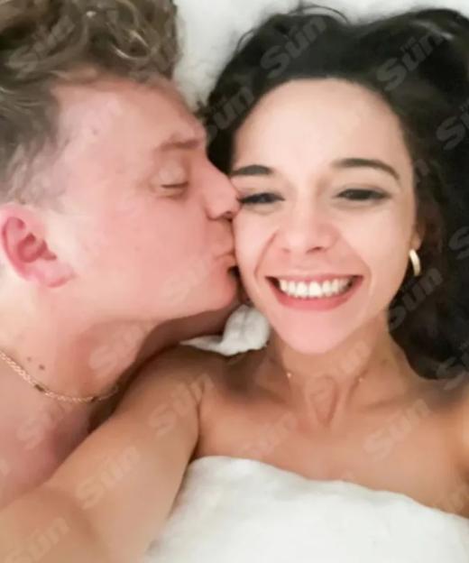 Charlotte Chiltern and Conor Maynard, with Conor kissing Charlotte's cheek.