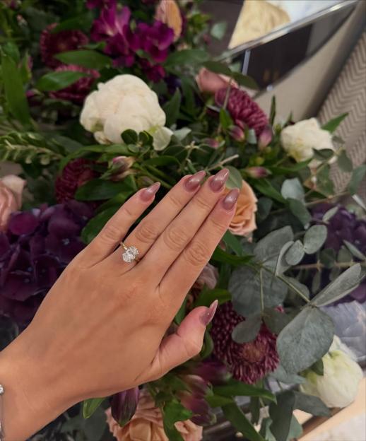 Lucy Fallon showcasing her engagement ring