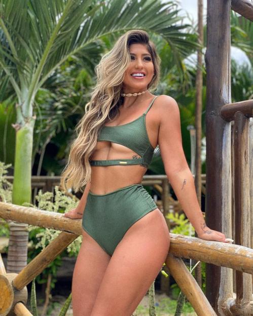 Gabrielle Figueiredo in a green bikini.