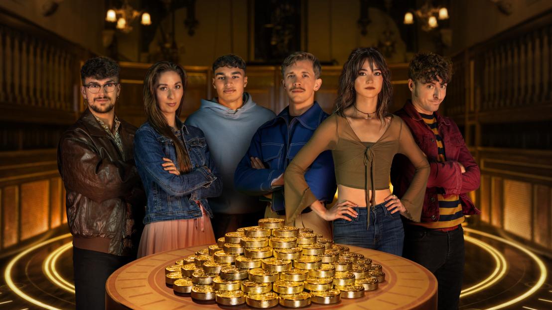 Jack, Rachel, Faraaz, Stephen, Jade, and James, the last contestants remaining in The Traitors, stand around a table stacked with gold coins.
