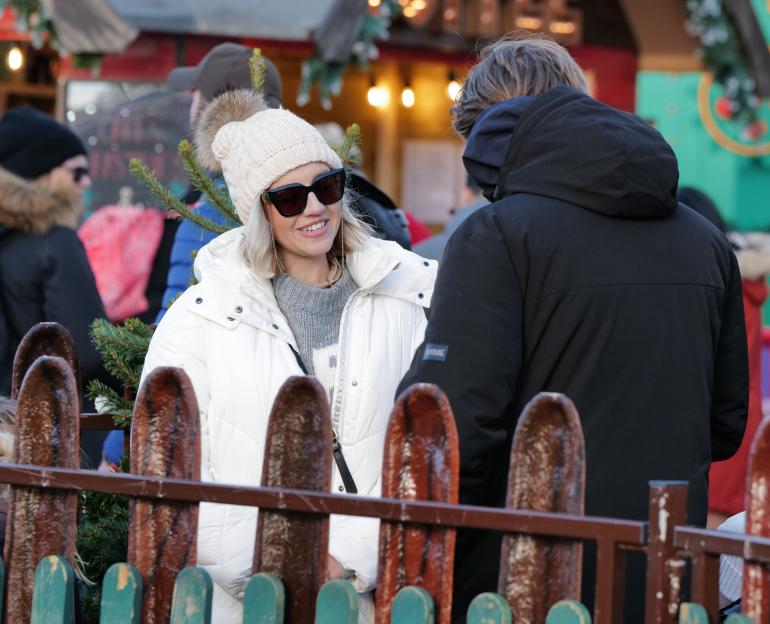 Kelsey Parker smiling at Winter Wonderland in Hyde Park.