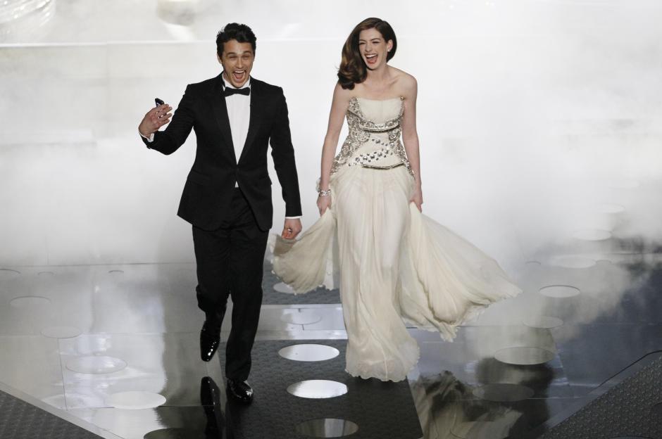 James Franco and Anne Hathaway enter the stage during the 83rd Annual Academy Awards.