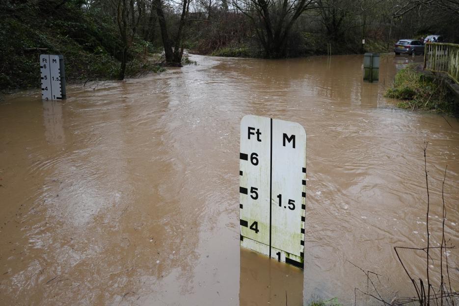A river ford at Houndsfield Lane in Birmingham under several feet of floodwater.