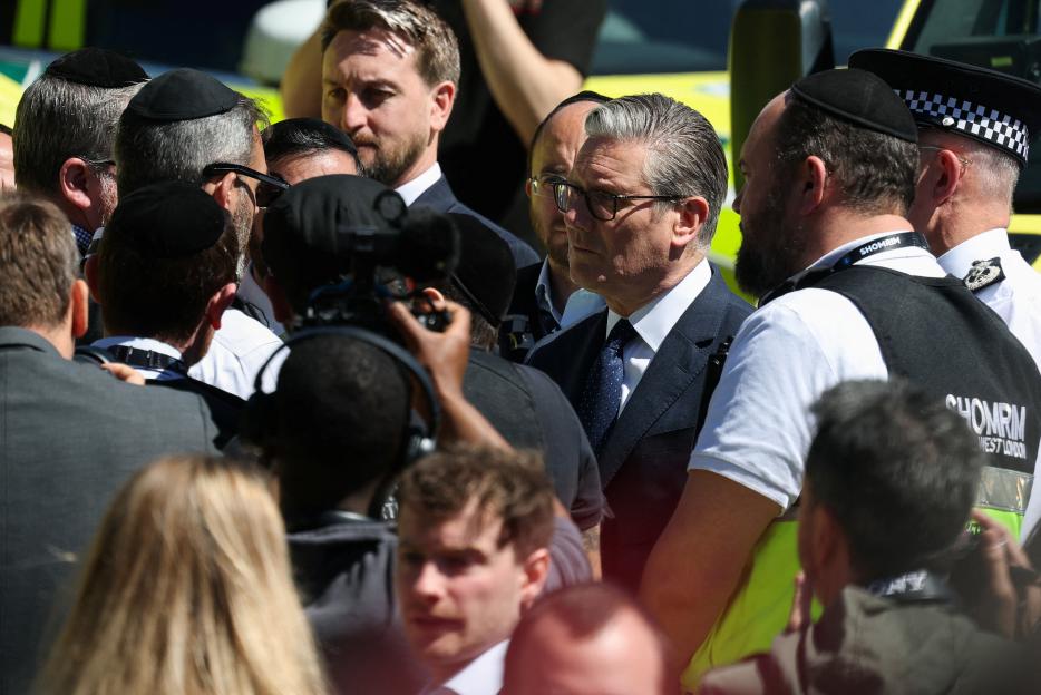 British Prime Minister Keir Starmer among a crowd in Golders Green.
