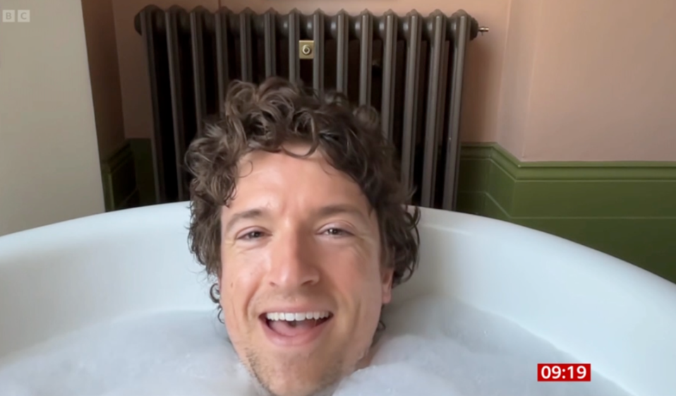 Greg James Makes a Splash on BBC Breakfast from a Bath After Raising £4 Million for Comic Relief!