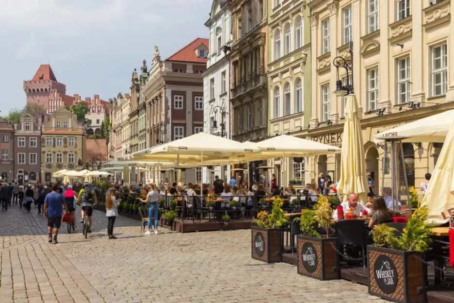 Outdoor dining area of a restaurant in the Old Town of Poznań, Poland.