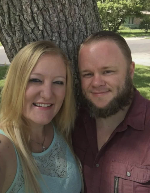 Casei Jones and her husband Michael Wayne Jones Jr. smiling for a photo.