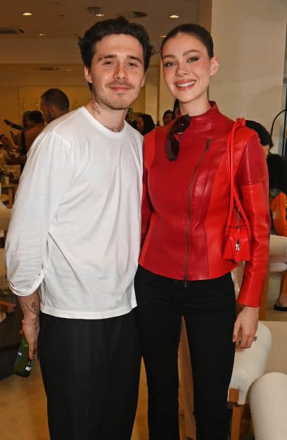 Brooklyn Beckham and Nicola Peltz attend the Formula 1 Etihad Airways Abu Dhabi Grand Prix.