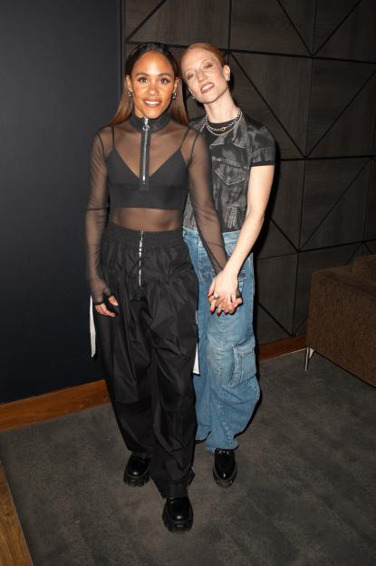 Alex Scott MBE and Jess Glynne attending Usher's concert.