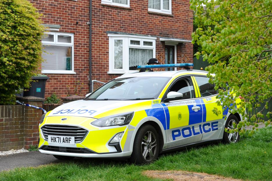 A police car at the scene of Frances Obiefuleh's home.