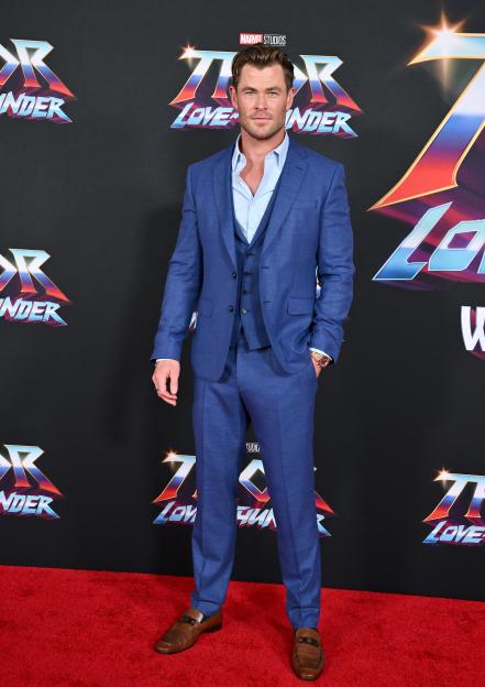 Chris Hemsworth in a blue suit at the "Thor: Love and Thunder" premiere.