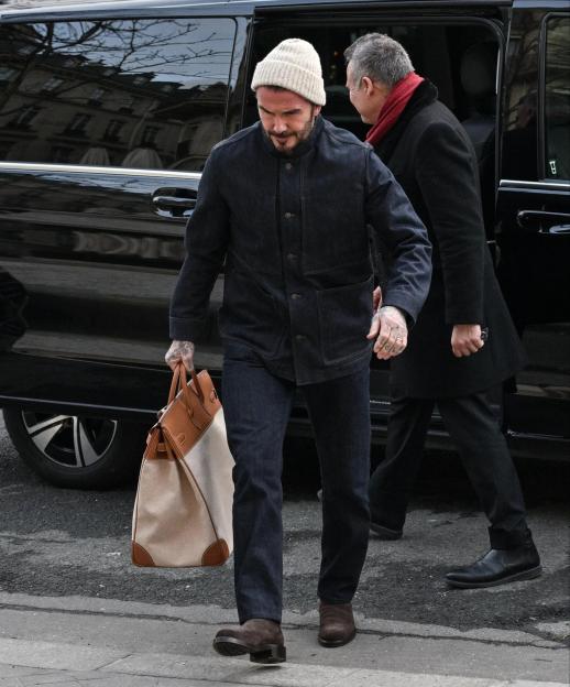 David Beckham Appears Stressed Amid Brooklyn Feud at Paris Fashion Week