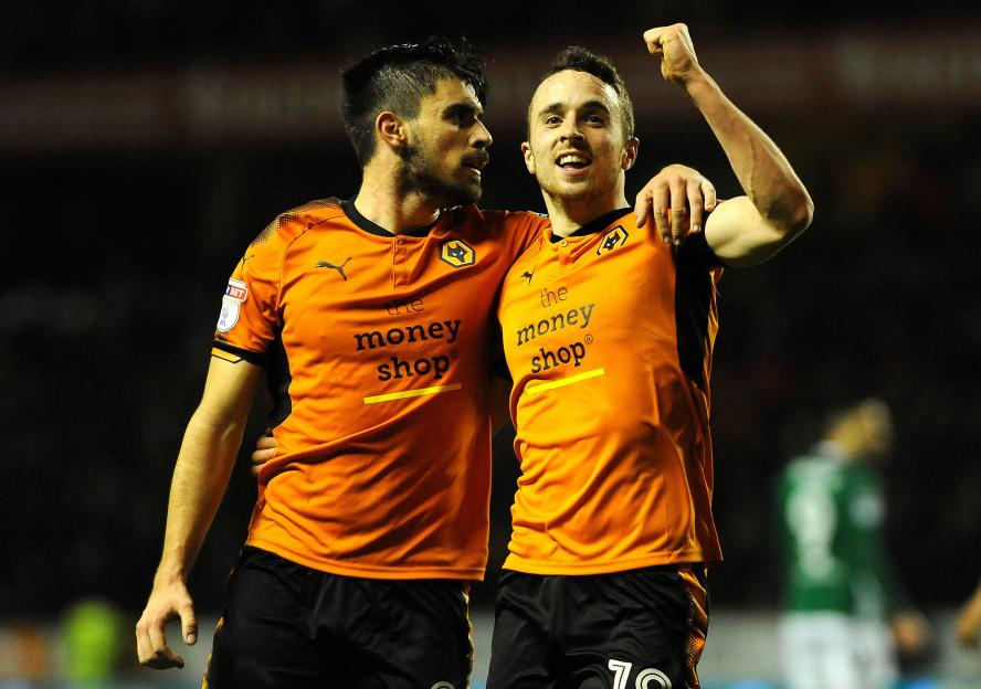 Diogo Jota and Ruben Neves of Wolverhampton Wanderers celebrating a goal.