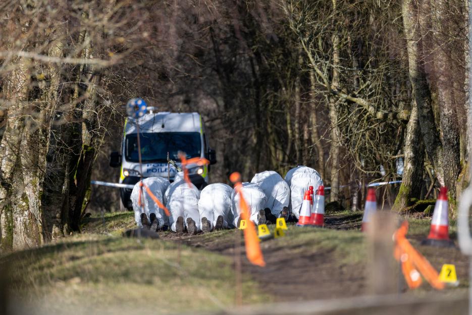 Pitilie, near Aberfeldy, UK. 29th Feb, 2024. This is Police Scotland Forensics searchin the murder scene of Brian Low on the very popular footpath. The White suited teams are on their hands and knees methodically searchin every inch of the scene. The