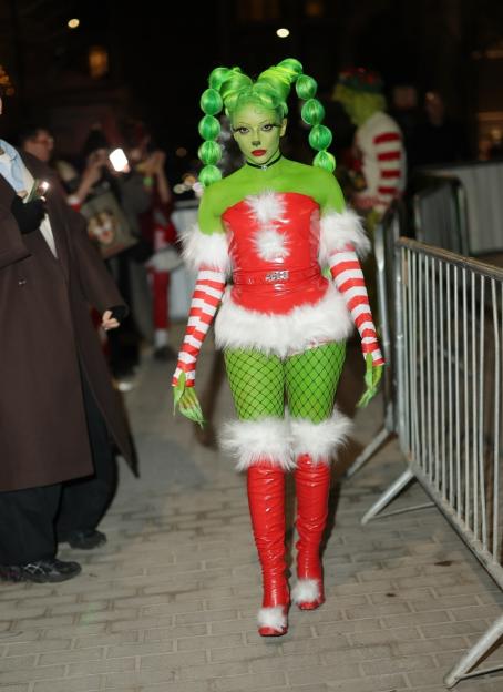 Jade Thirlwall dressed as the Grinch at a birthday party.