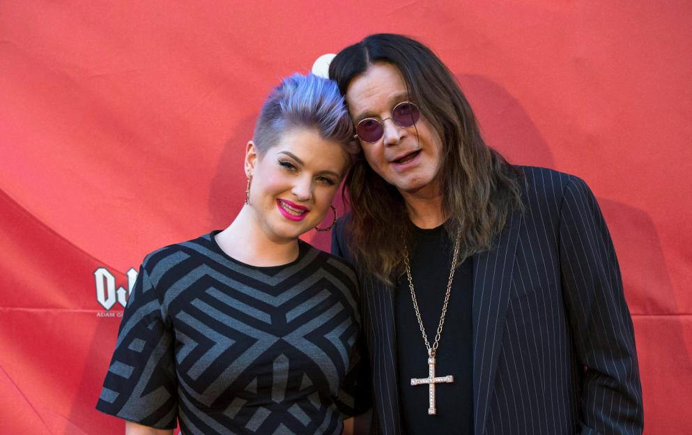: Musician Osbourne and his daughter Kelly pose at the 10th Annual MusiCares MAP Fund Benefit concert at Club Nokia in Los Angeles