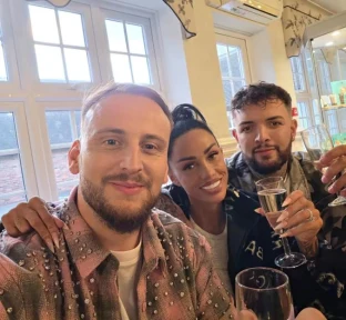 Katie Price puts on a brave face as she hits the bubbles to celebrate best friends’ engagement