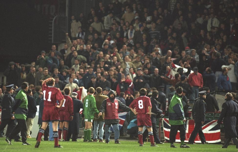 England soccer fans, many giving Nazi salutes, during a game that was abandoned due to violence.