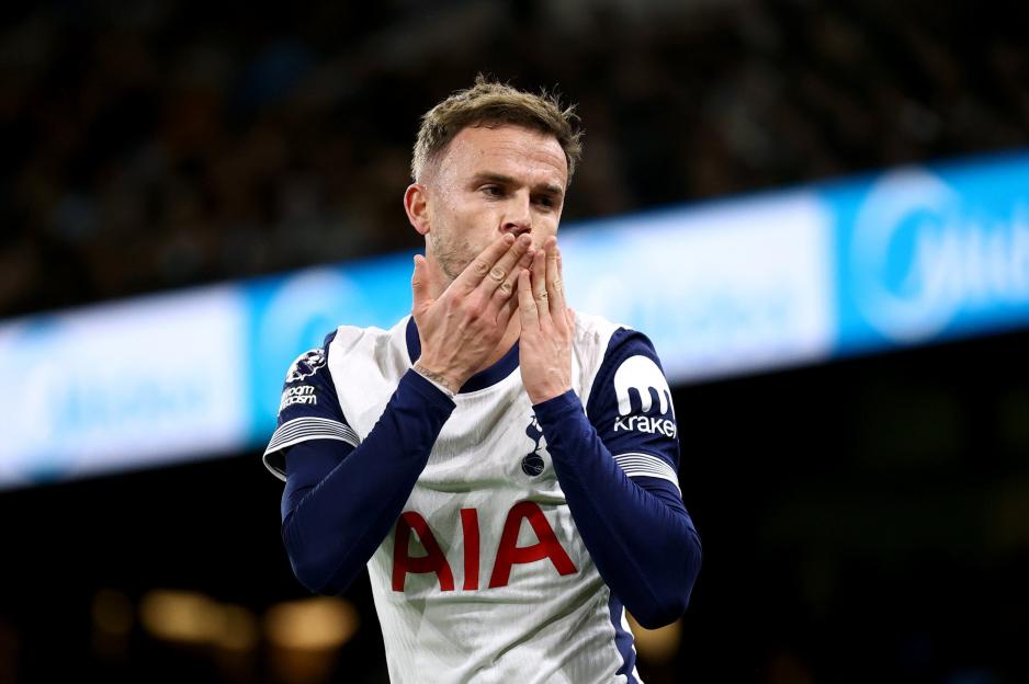 Tottenham Hotspur FC player Oliver Skipp blows a kiss to the crowd.