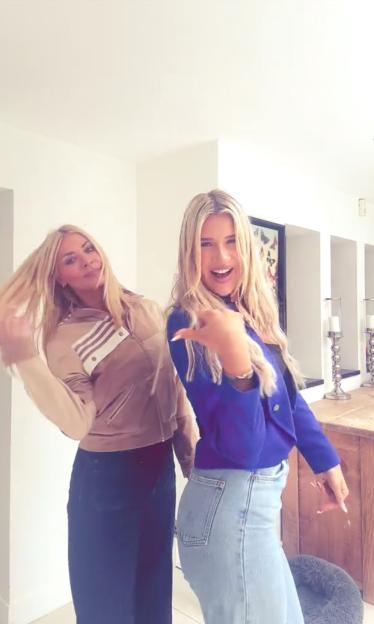 Tess Daly and her daughter Phoebe dance together.
