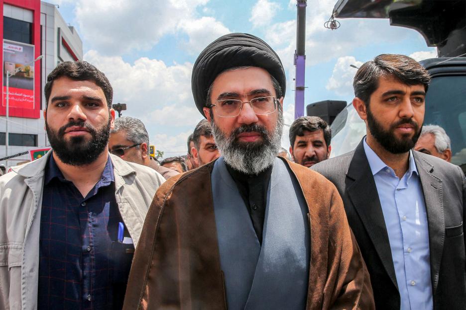 Mojtaba Khamenei, son of Iran's supreme leader, walks on a street in Tehran.