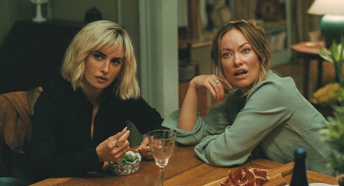 Penelope Cruz and Olivia Wilde in a scene from "The Invite."