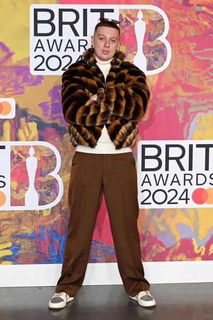 Aitch attends the BRIT Awards 2024.