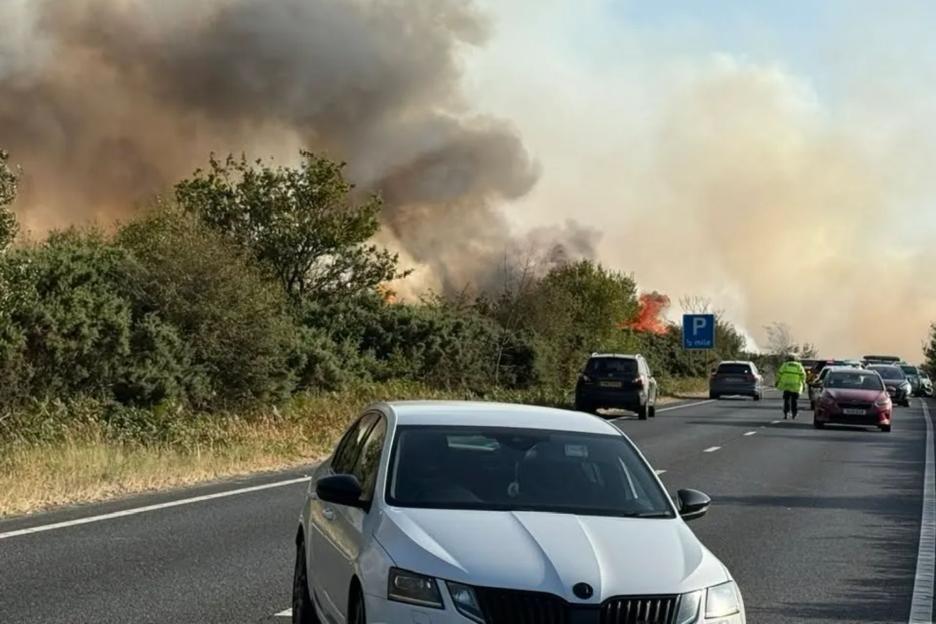 Major Road Closed After Car Fire Sparks Massive Traffic Jam and Smoke Visible for Miles