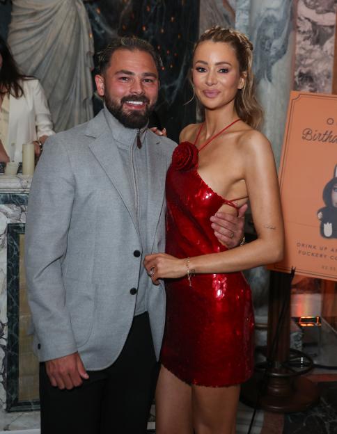 Olivia Attwood and Bradley Dack pose together at her birthday celebration.