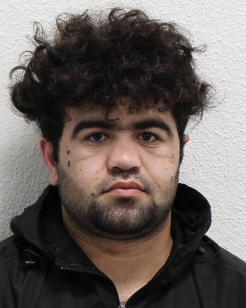 Custody image of Zeeshan Bangash.