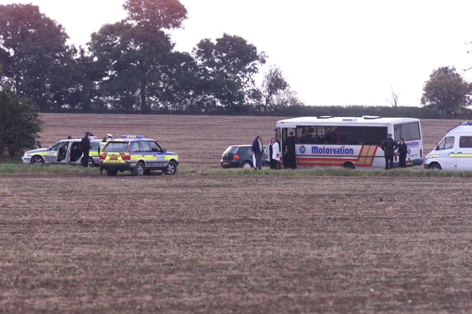 The jury and emergency services at the Russell murder scene in Chillenden.
