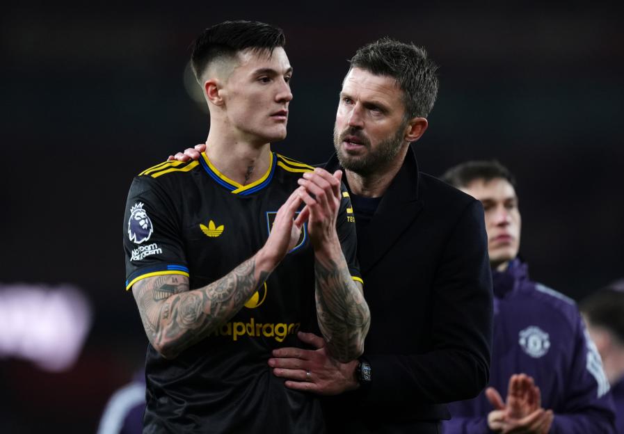 Manchester United manager Michael Carrick celebrating the win with player Benjamin Sesko.