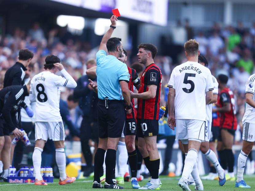 Referee showing a red card to Bournemouth's Ryan Christie.