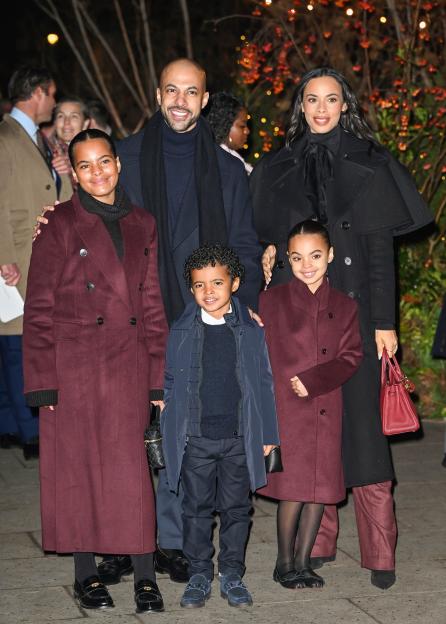 Marvin Humes and Rochelle Humes with their three children, all wearing coats, at the "Together At Christmas" carol service.