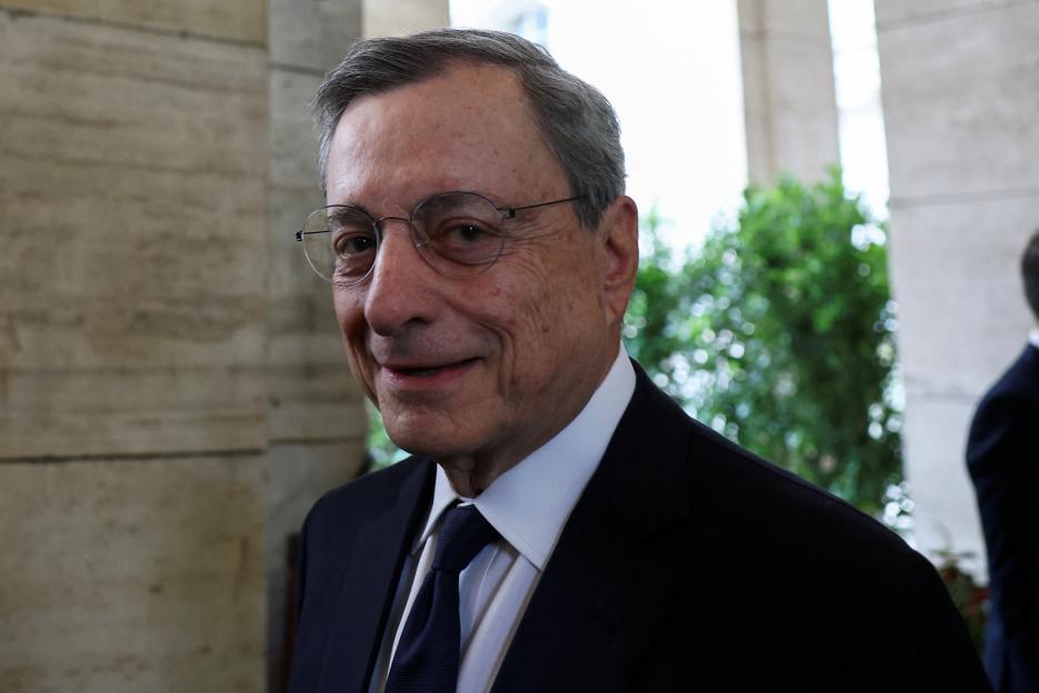 Former European Central Bank President Mario Draghi looks on as he leaves after the Bank of Italy annual assembly in Rome.