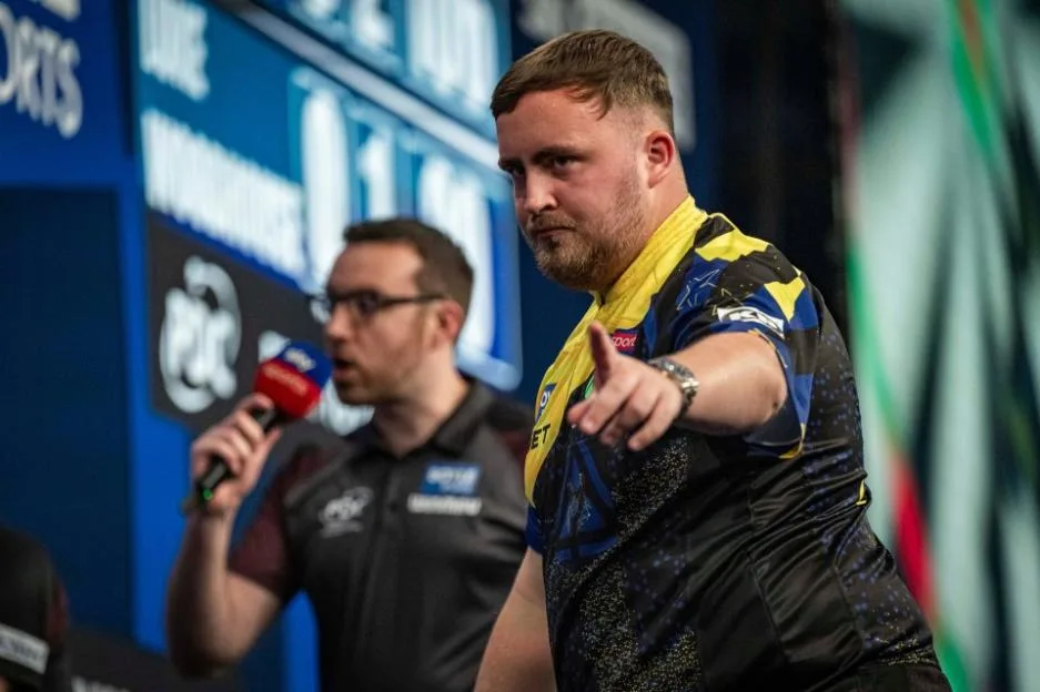 Luke Littler celebrates winning a leg during his match at the PDC World Grand Prix Darts.