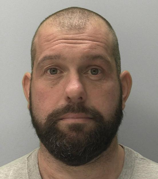 Man raised by serial killer says stepdad forcibly tattooed him aged 13