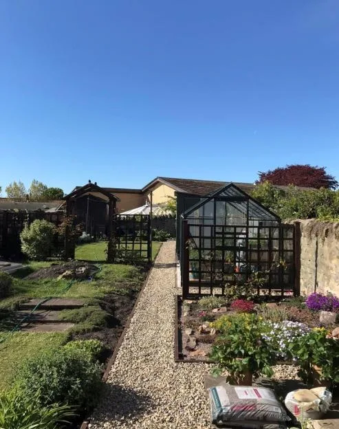 Tom and Hilda Young's garden in Berwick-upon-Tweed before the building of the new hospital.