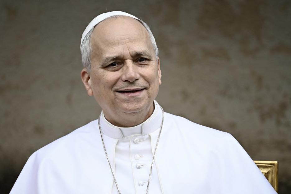 Pope Leo XIV smiling during a pastoral visit.