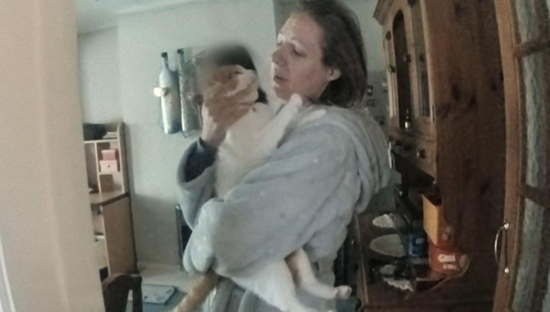 Lucy Letby holding a cat.