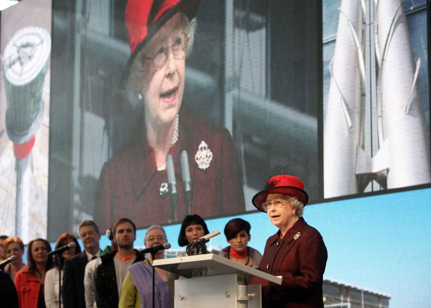 Queen Elizabeth II giving a speech to open Terminal 5 at Heathrow Airport.