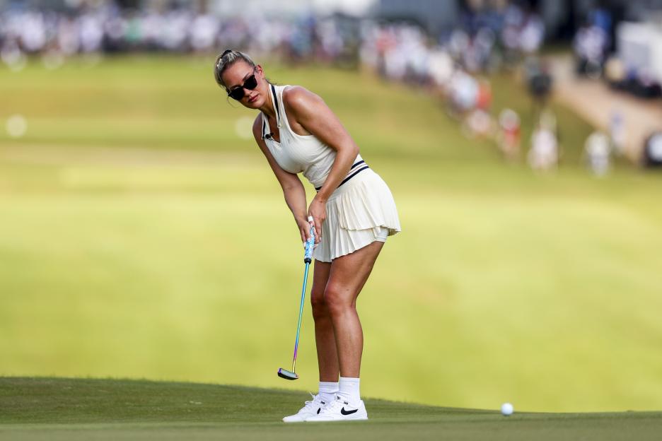 Paige Spiranac watches a putt on the 10th hole during the 2024 Creator Classic.