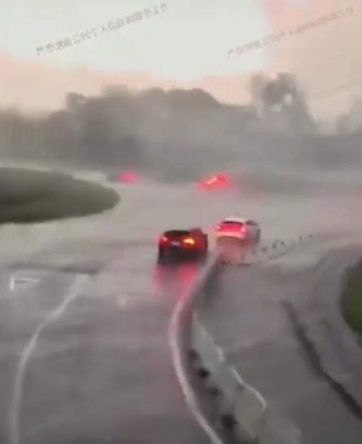 A car is tossed by a weak tornado in Haining, Zhejiang Province.