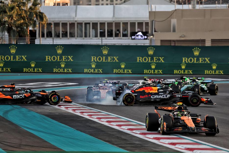Lando Norris (GBR) McLaren MCL38 leads at the start of the race as Oscar Piastri (AUS) McLaren MCL38 and Max Verstappen (NLD) Red Bull Racing RB20 collide. Formula 1 World Championship, Rd 24, Abu Dhabi Grand Prix, Sunday 8th December 2024. Yas Mari