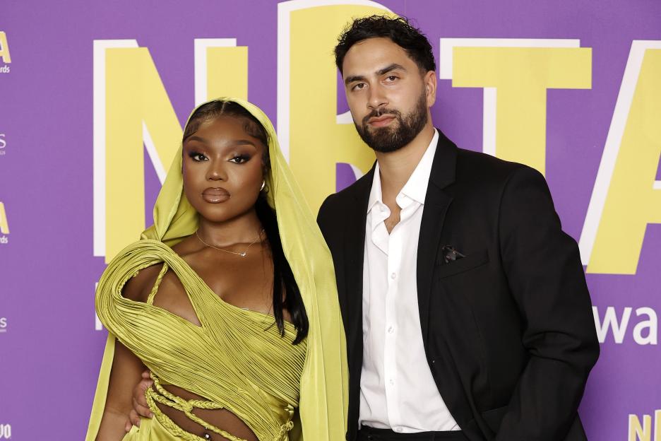 Whitney Adebayo and Lochan Nowacki posing for a photo at the National Reality TV Awards.