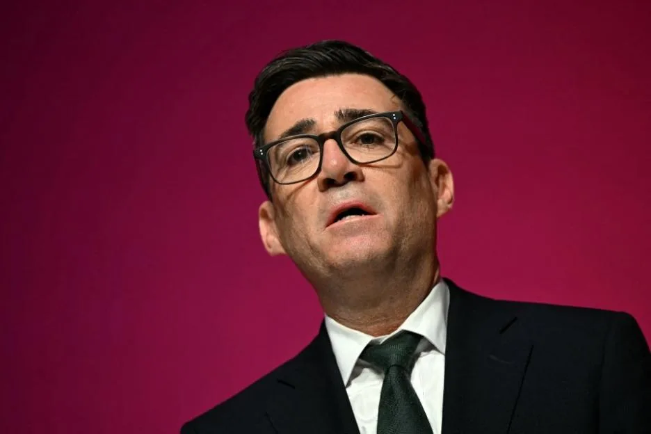 Britain's Prime Minister Andy Burnham sings "The Red Flag" on the final day of the annual Labour Party conference in Liverpool.