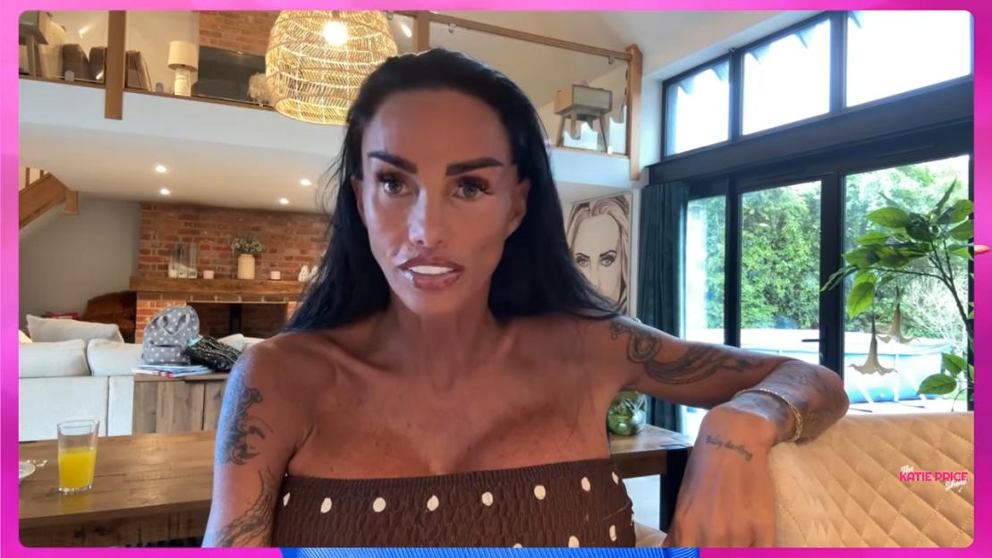 Katie Price in a brown strapless top.