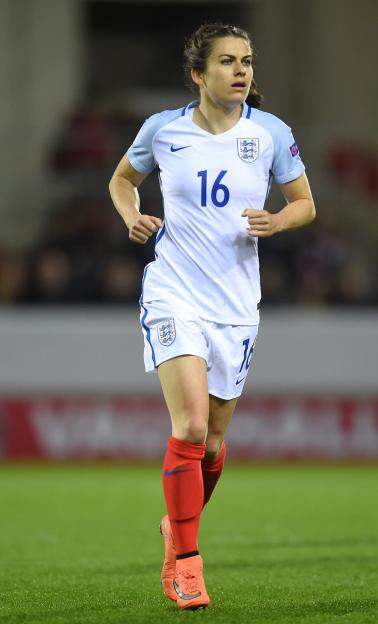 Karen Carney of England running on the field during the UEFA Women's European Qualifier.
